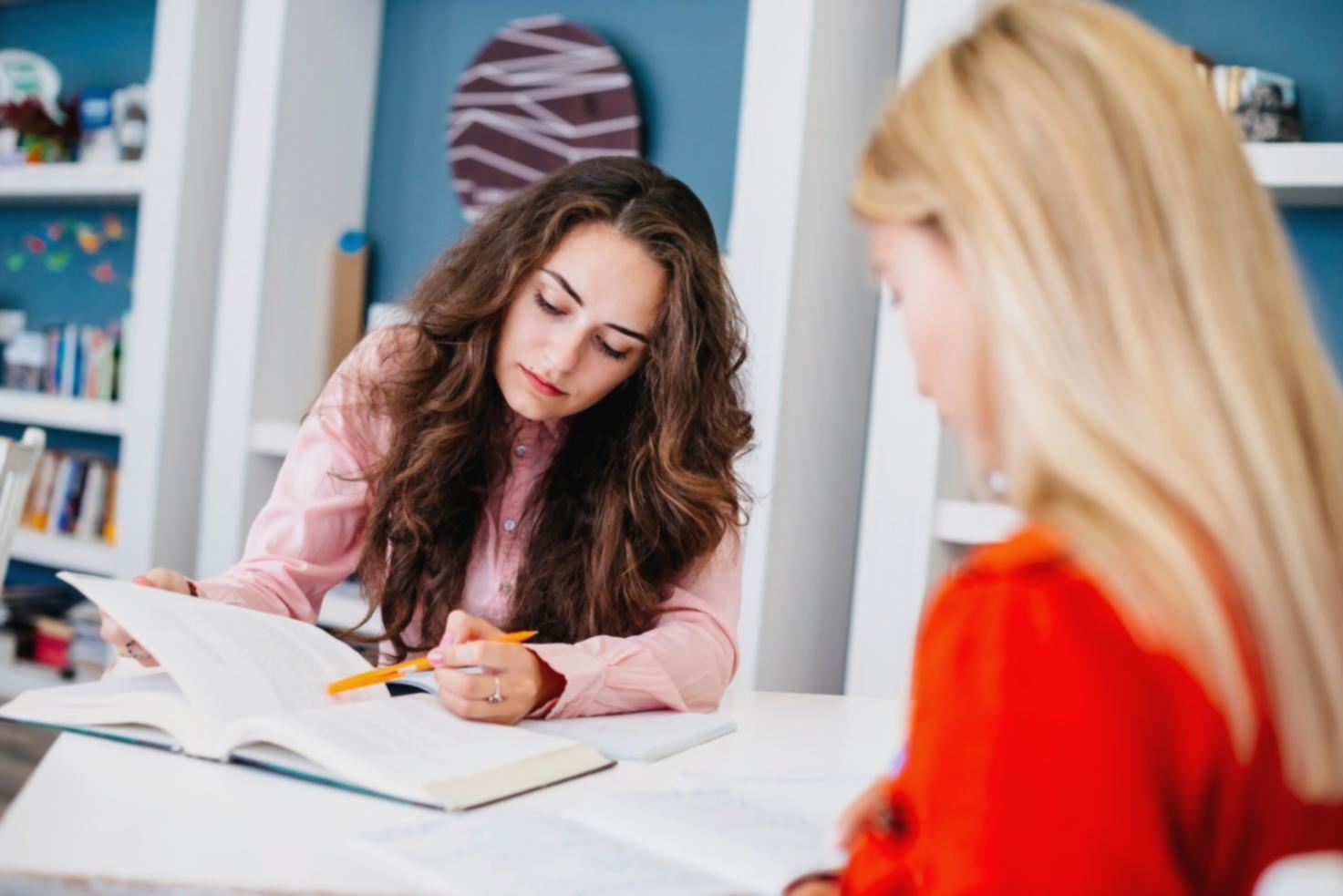Team collaboration session discussing website content strategy and client results