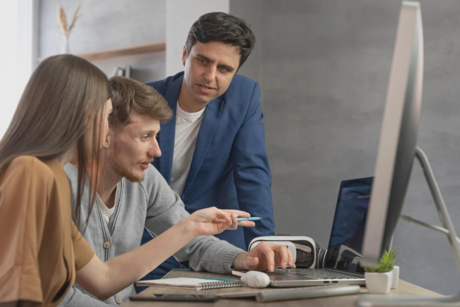Business professional reviewing website analytics on laptop showing content performance improvements