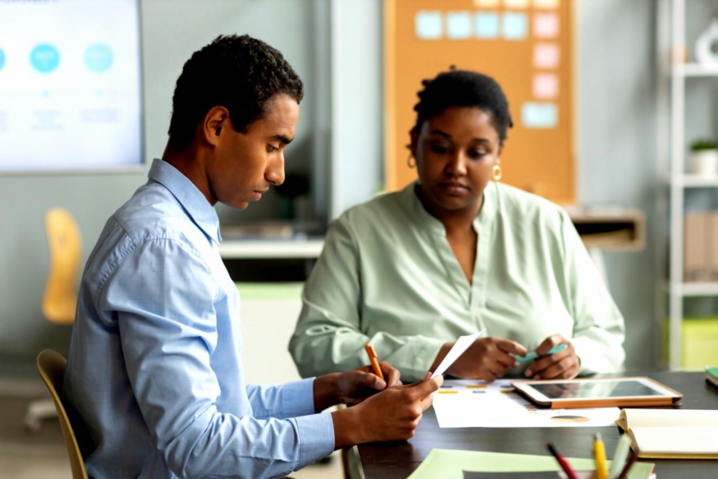 Strategic planning session with business documentation